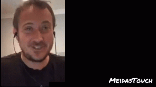 Man In Headphones Next To Sheesh Meidastouch Sign GIF