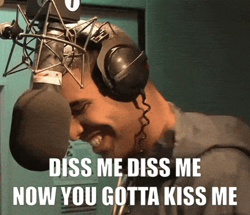 Man in Headphones Saying Kiss Me