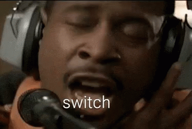 Man in Headphones Saying Switch into Microphone