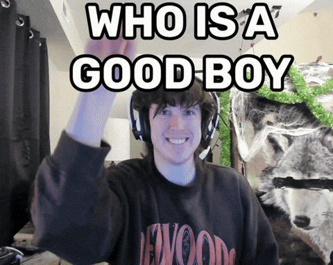 Man in Headphones Saying Who Is a Good Boy