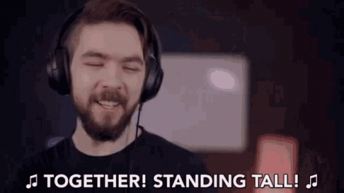 Man in Headphones Singing Together Standing Tall