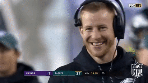 Man In Headphones Smiling At Vikings Vs Eagles Game GIF