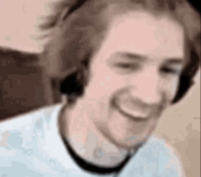 Man In Headphones Smiling Blurry Photo GIF