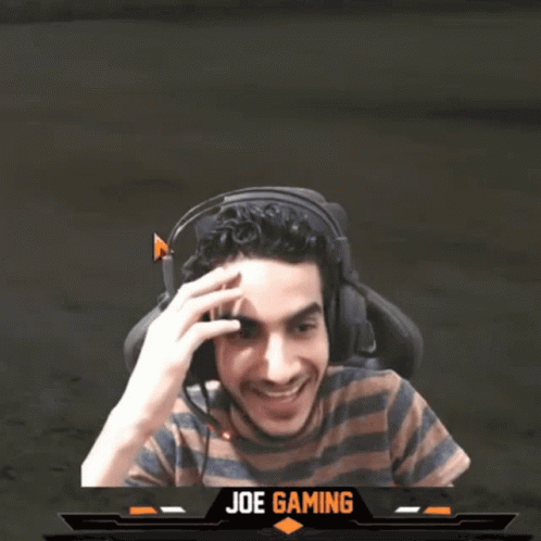 Man in Headphones With Joe Gaming