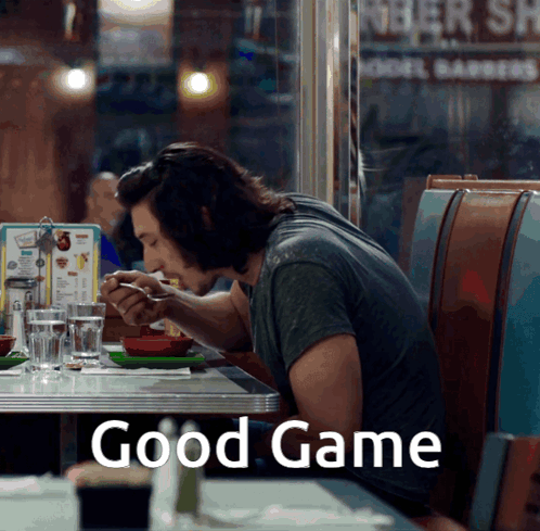Man in Headphones With Microphone Says Nice Game