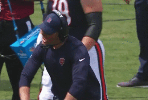 Man In Headphones With Number 10 Jersey GIF