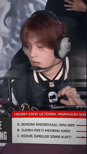 Man In Headphones With Onic Shirt Playing Video Game GIF