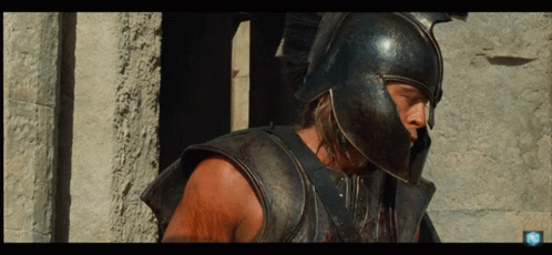 Man In Helmet And Armor At Stone Pillars GIF