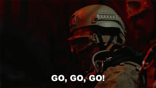 Man in Helmet and Goggles Saying Go Go Go