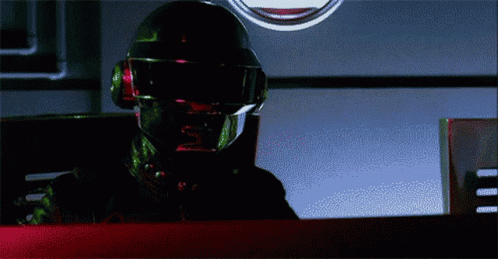 Man in Helmet and Goggles With S on Face