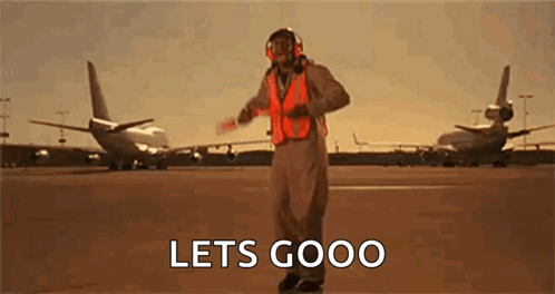 Man in Helmet and Safety Vest on Airport Runway