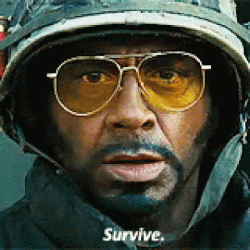 Man In Helmet And Sunglasses Survive GIF