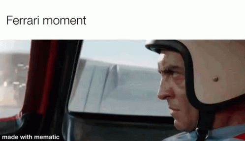 Man in Helmet Driving Car