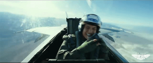 Man In Helmet Flying In Top Gun GIF