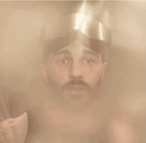 Man in Helmet Looking at Camera