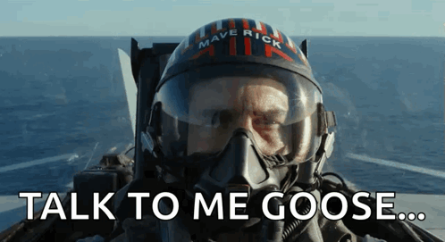 Man in Helmet Saying Talk to Me Goose