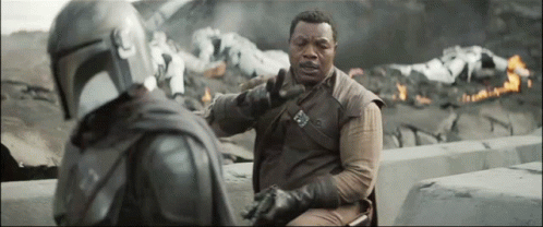 Man in Helmet Talking to Suit