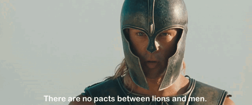 Man In Helmet There Are No Pacts Between Lions And Men GIF