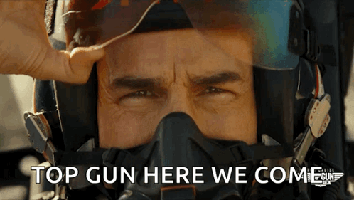 Man in Helmet with Top Gun Here We Come