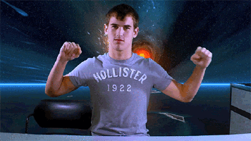 Man In Hollister 1922 T-Shirt Flexing Muscles GIF