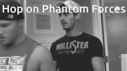 Man In Hollister Shirt Next To Man In Hat GIF