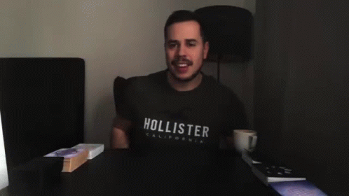 Man In Hollister T-Shirt Pouring Coffee GIF