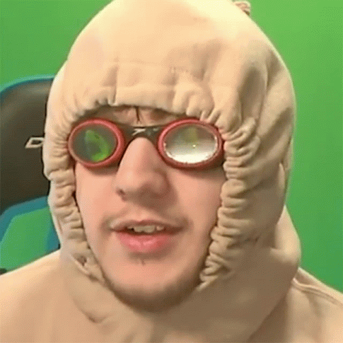Man in Hood and Goggles Looking at Camera