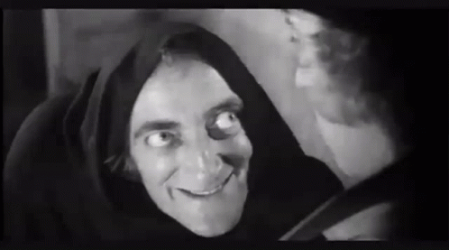 Man In Hood Smiling Black And White GIF