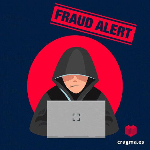 Man in Hood Using Laptop with Fraud Alert Stamp