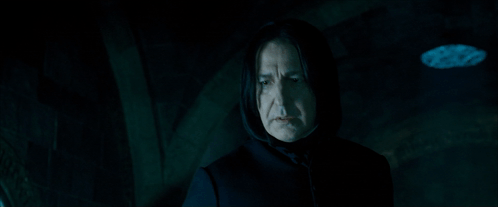 Man in Hooded Cloak Pointing