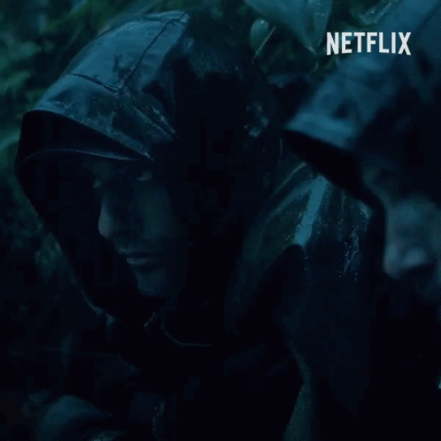Man in Hooded Jacket With Netflix