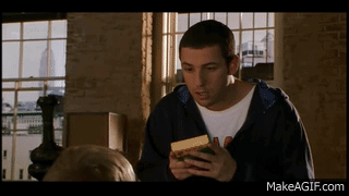 Man in Hoodie Holding Cheese