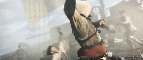 Man in Hoodie Jumping as People Run