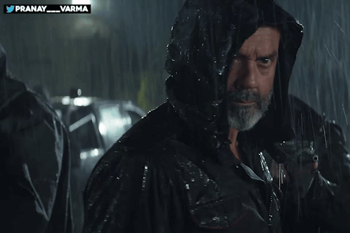 Man in Hoodie Rain With Twitter Logo pranay_varma