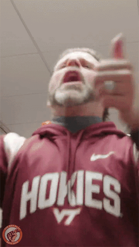 Man in Hoodie Saying Hokies VT
