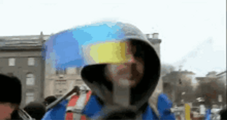 man-in-hoodie-waving-flag-of-ukraine-pwiwvaymhk8qcuxm.gif