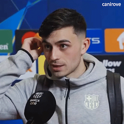 Man in Hoodie with Barça Logo