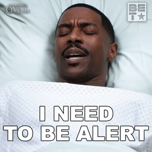 Man in Hospital Bed I Need to Be Alert