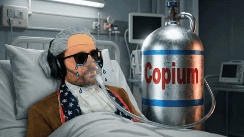 Man in Hospital Bed With Oxygen Mask and Copium Cylinder
