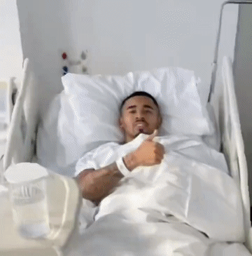 Man In Hospital Gown Giving Thumbs Up GIF