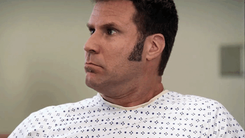 Man in Hospital Gown Looking Left