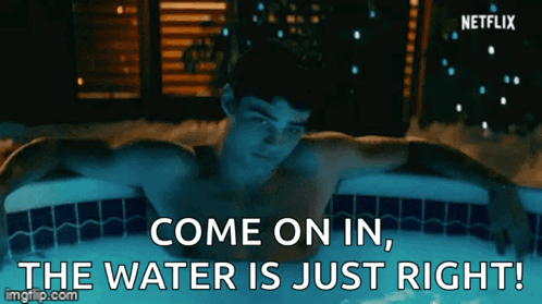 Man in Hot Tub Saying Come On In The Water Is Just Right
