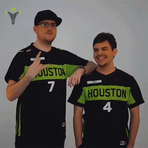 Man in Houston Jersey and Another Man