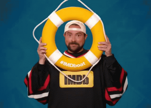 Man in imdb Shirt Holding Life Preserver