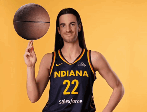Man in Indiana 22 Jersey Holding Basketball