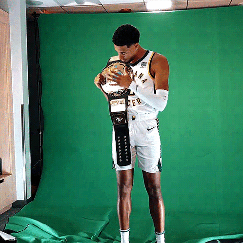 Man In Indiana Jersey Holding Trophy GIF