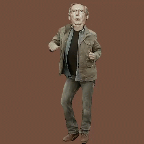 Man in Jacket and Jeans Dancing with Mouth Open