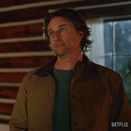 Man in Jacket Saying No Regrets Netflix Ad