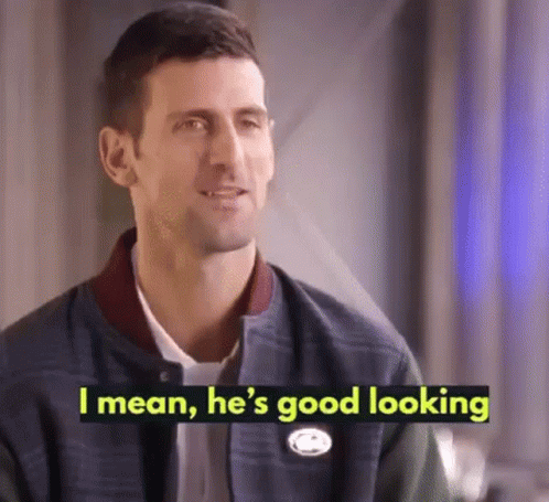 Man in Jacket Telling Another He's Good Looking