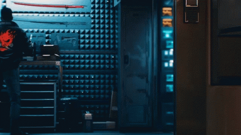 Man In Jacket With Red Skull On Back GIF